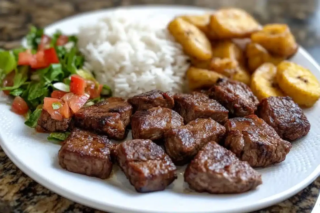 Perfectly fried carne frita on a serving plate